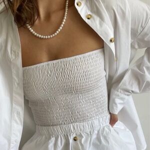 DONNI. Cream Smocked Top